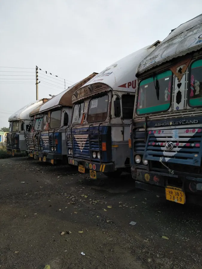 Line of Indian trucks parked